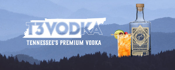Tennessee state graphic with knockout text that reads T3 Vodka: Tennessee's Premium Vodka. T3 Vodka bottle with a cocktail and mountain background. 