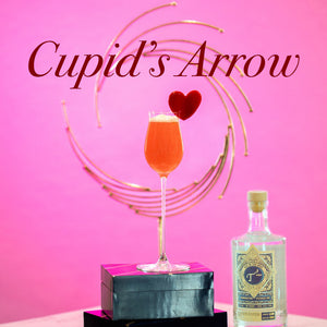 Cupid's Arrow cocktail with a bottle of T3 Vodka on a pink background
